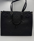 Louis Vuitton OnTheGo GM handväska i Monogram Empreinte